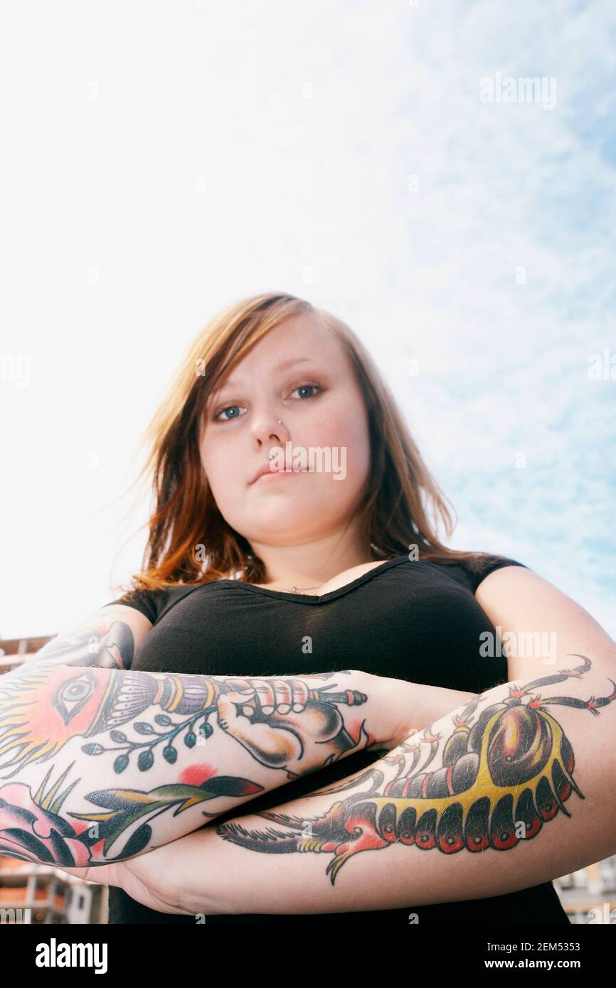Close up woman arms crossed hi-res stock photography and images - Alamy