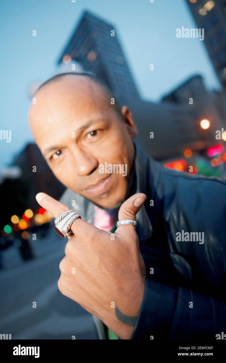 Portrait of a mid adult man gesturing Stock Photo