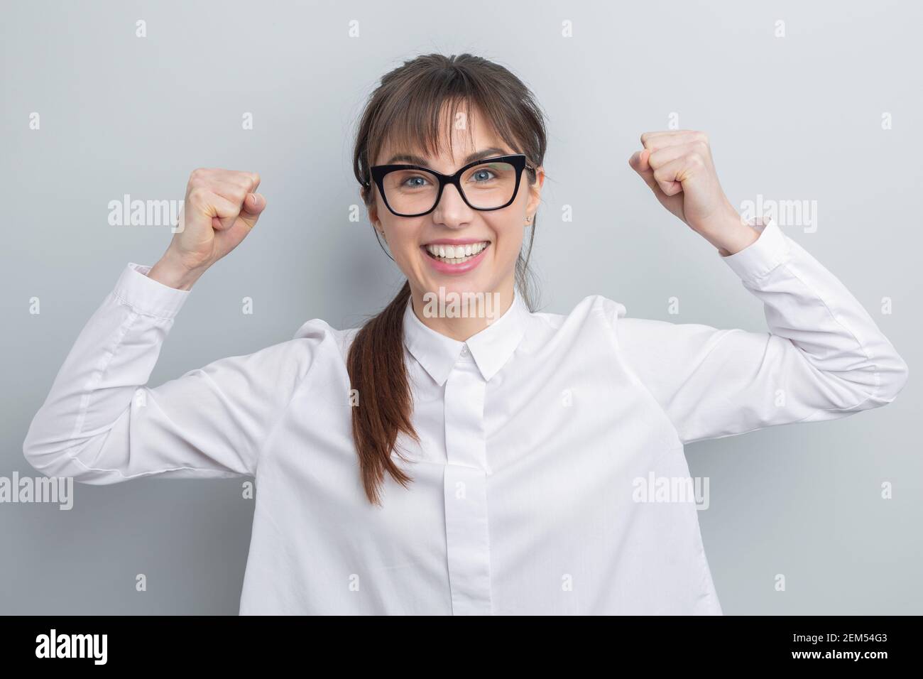 Portrait of a strong business woman wearing glasses. Stock Photo