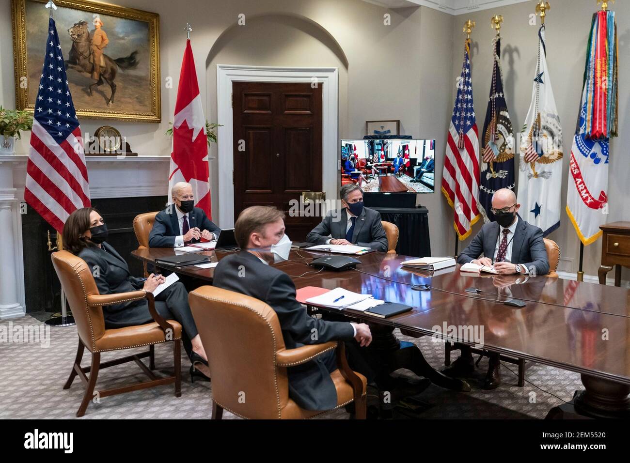 U.S President Joe Biden and Vice President Kamala Harris hold a video conference meeting with Canadian Prime Minister Justin Trudeau from the Roosevelt Room of the White House February 23, 2021 in Washington, D.C. Stock Photo