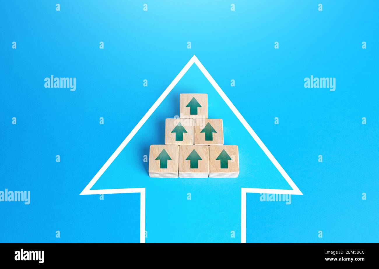 Blocks with unidirectional arrows united in a single move arrow. Directing all efforts and resources to achieve the goal and solve an urgent problem. Stock Photo