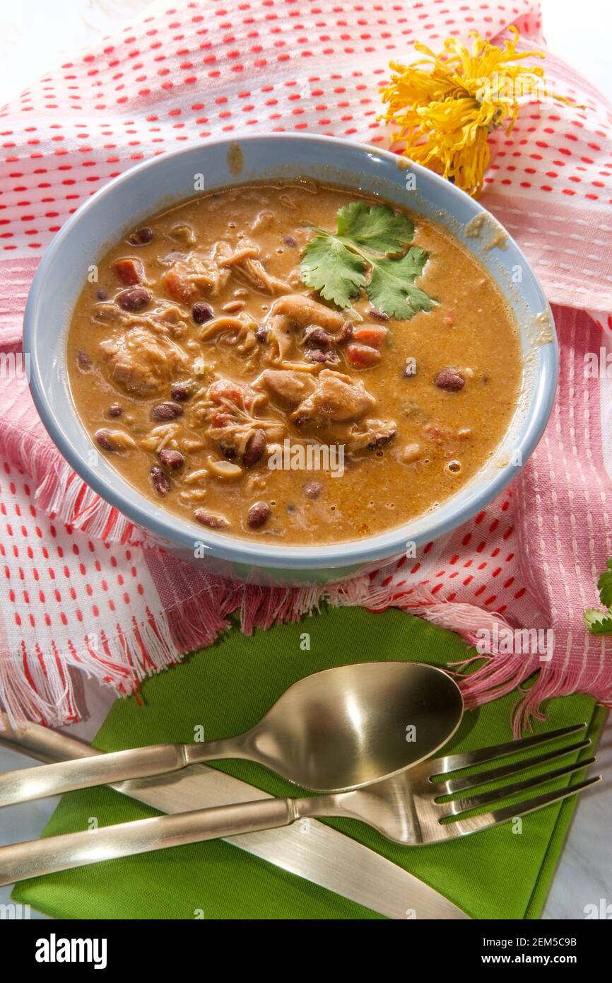 Creamy Mexican chicken enchilada black bean soup Stock Photo Alamy