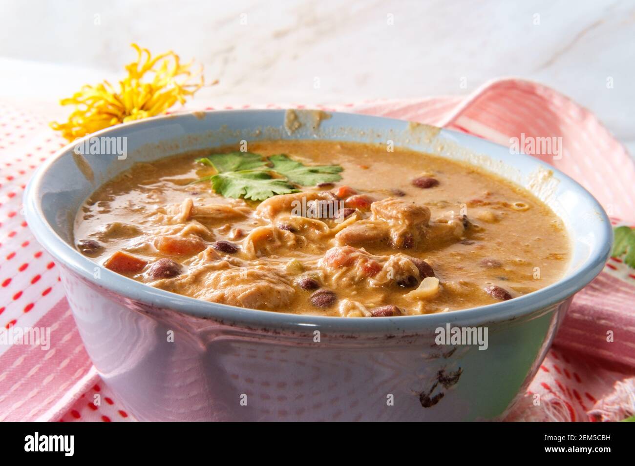 Creamy Mexican chicken enchilada black bean soup Stock Photo Alamy