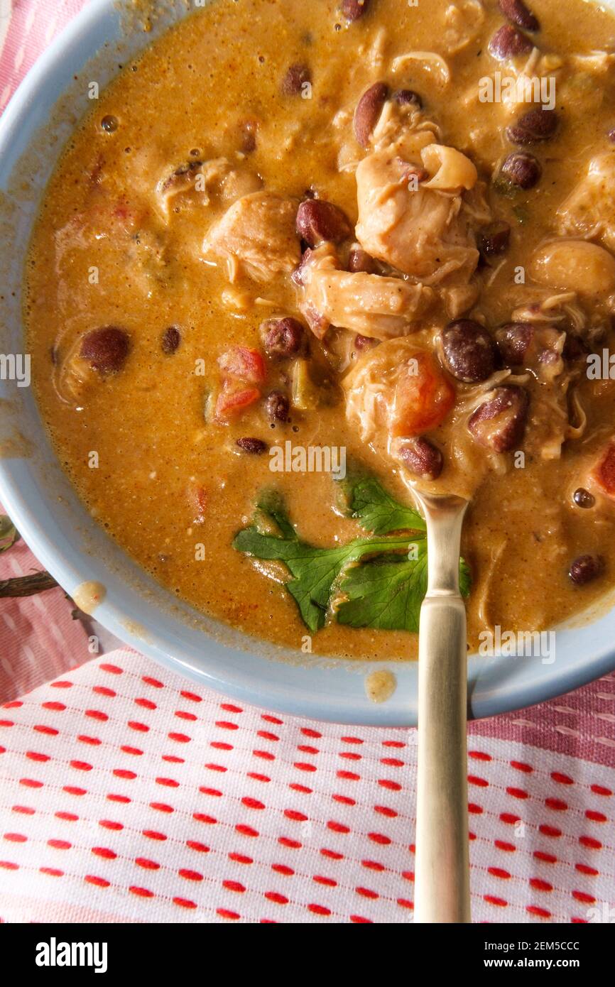 Creamy Mexican chicken enchilada black bean soup Stock Photo Alamy