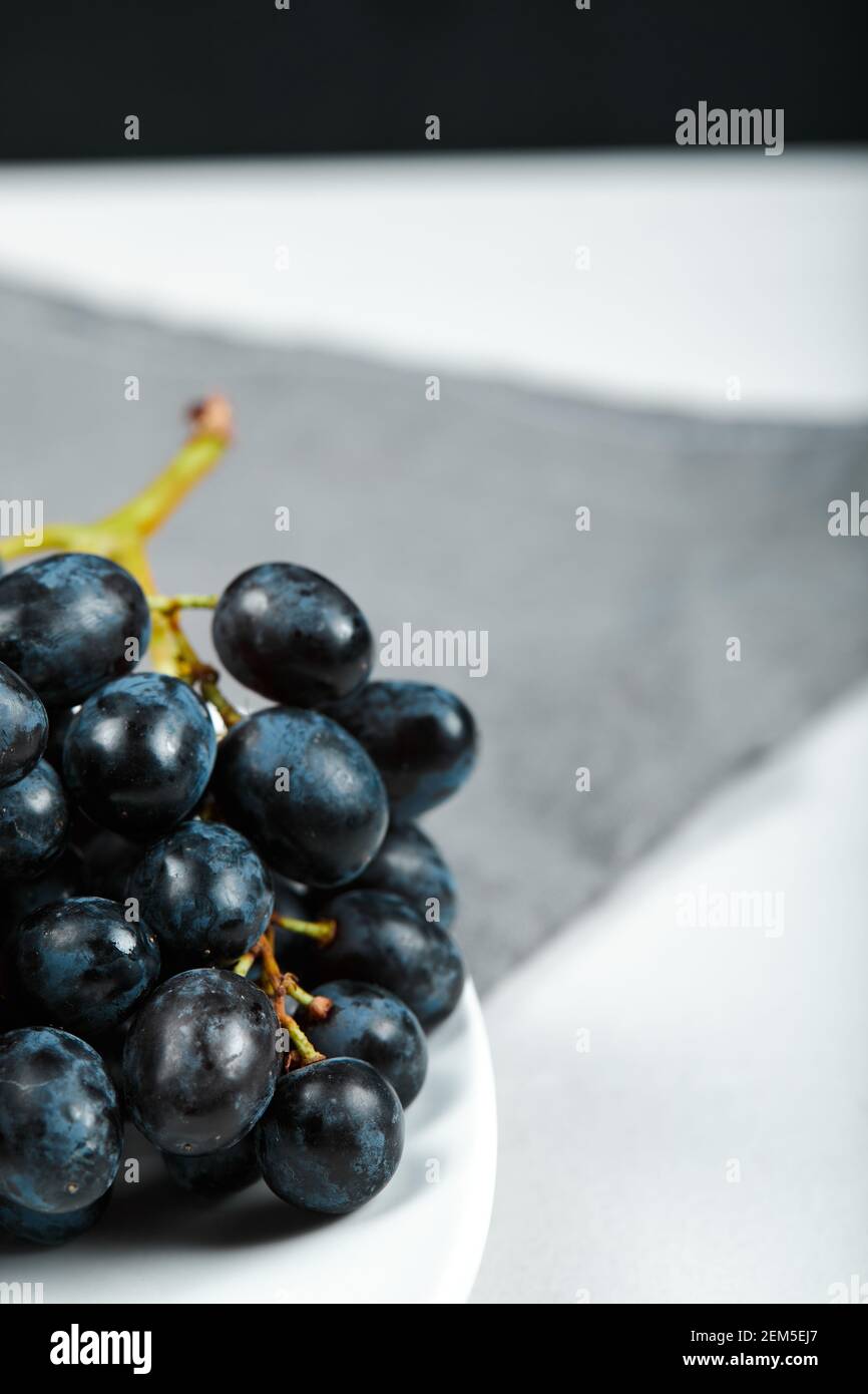 Black grape on white hi-res stock photography and images - Alamy