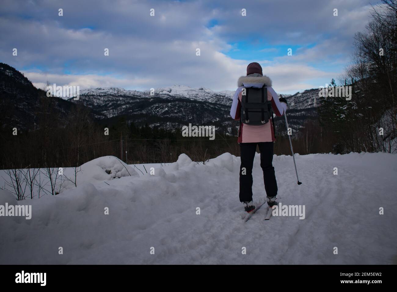Young Woman Cross Country Skiing in Norway Stock Photo