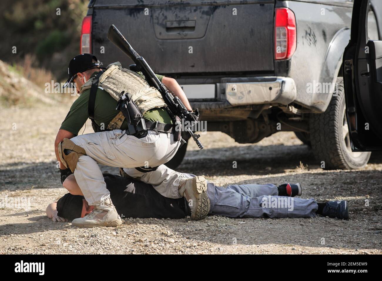 Army Soldiers detachment during complex anti-terrorist exercises. Shooting and weapons. Outdoor shooting range Stock Photo