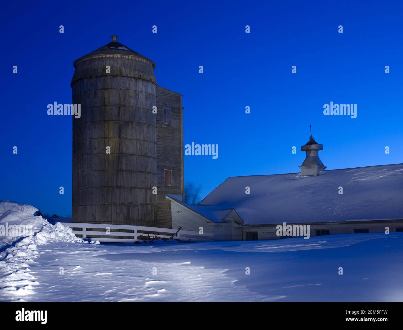 Shaker barn and silo in winter at Hancock Shaker Village in Pittsfield, Massachusetts Stock Photo