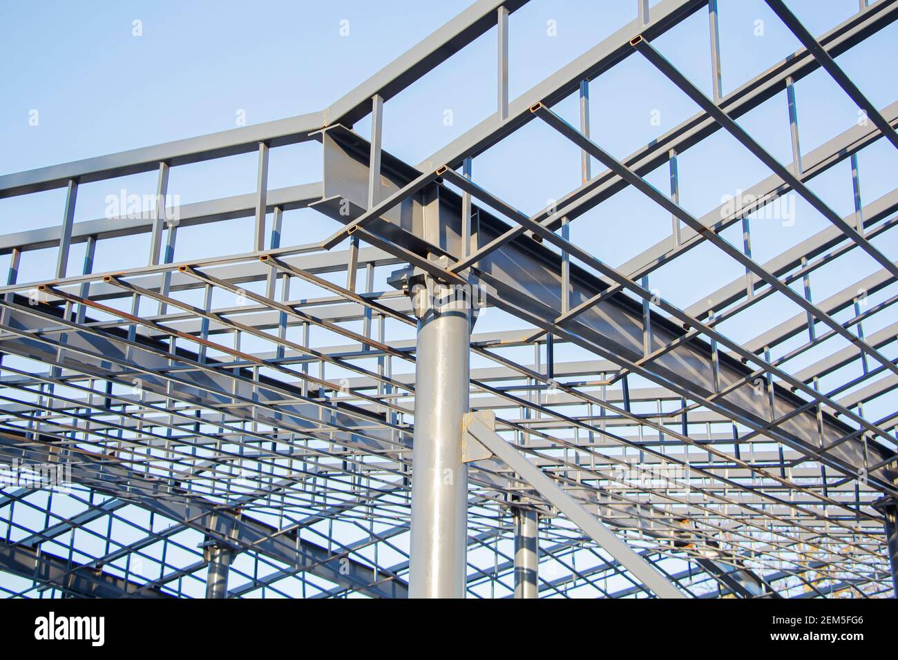 New residential construction home metal framing against a blue sky Stock Photo