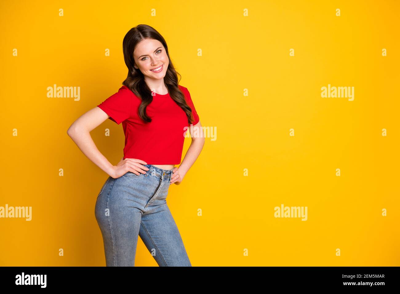 candid girl in faded jeans hi-res Alamy