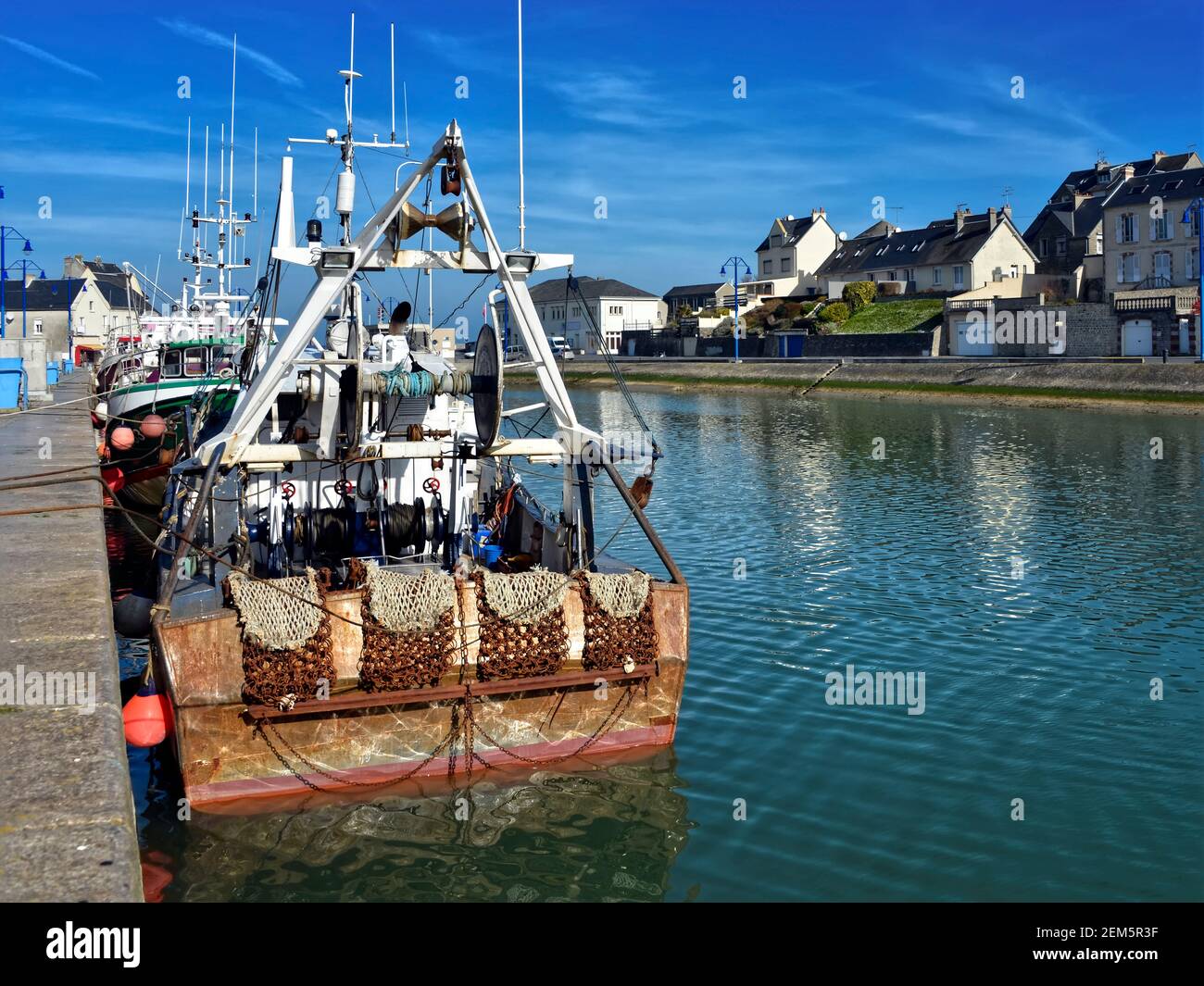 Fishing boat in Port-en-Bessin, a commune in the Calvados department in the Basse-Normandie region in northwestern France Stock Photo