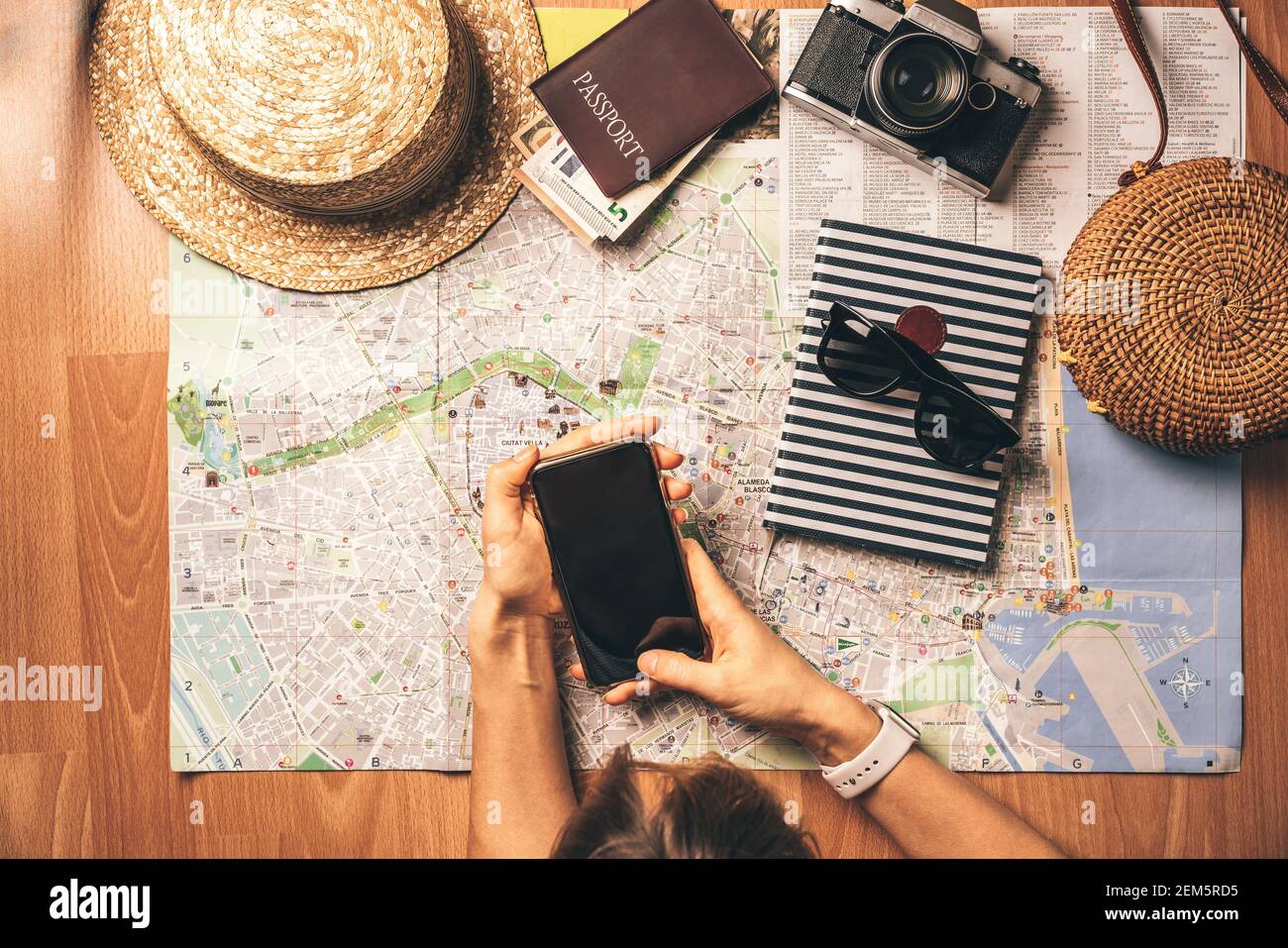 Top view travel concept with retro camera films, map and passport on ...