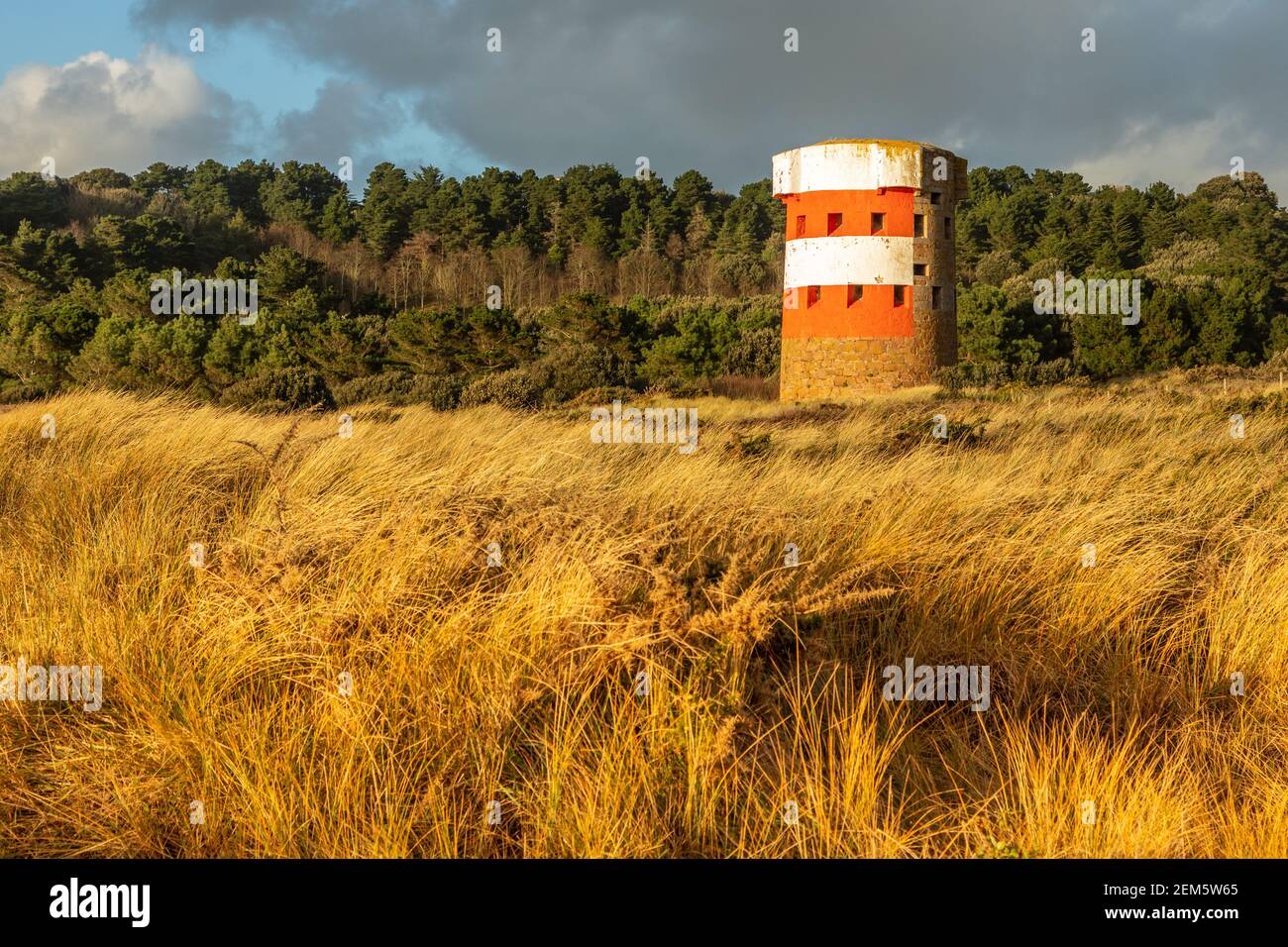 Saint Brelade British round coastal defence tower standing in the field, bailiwick of Jersey, Channel Islands Stock Photo