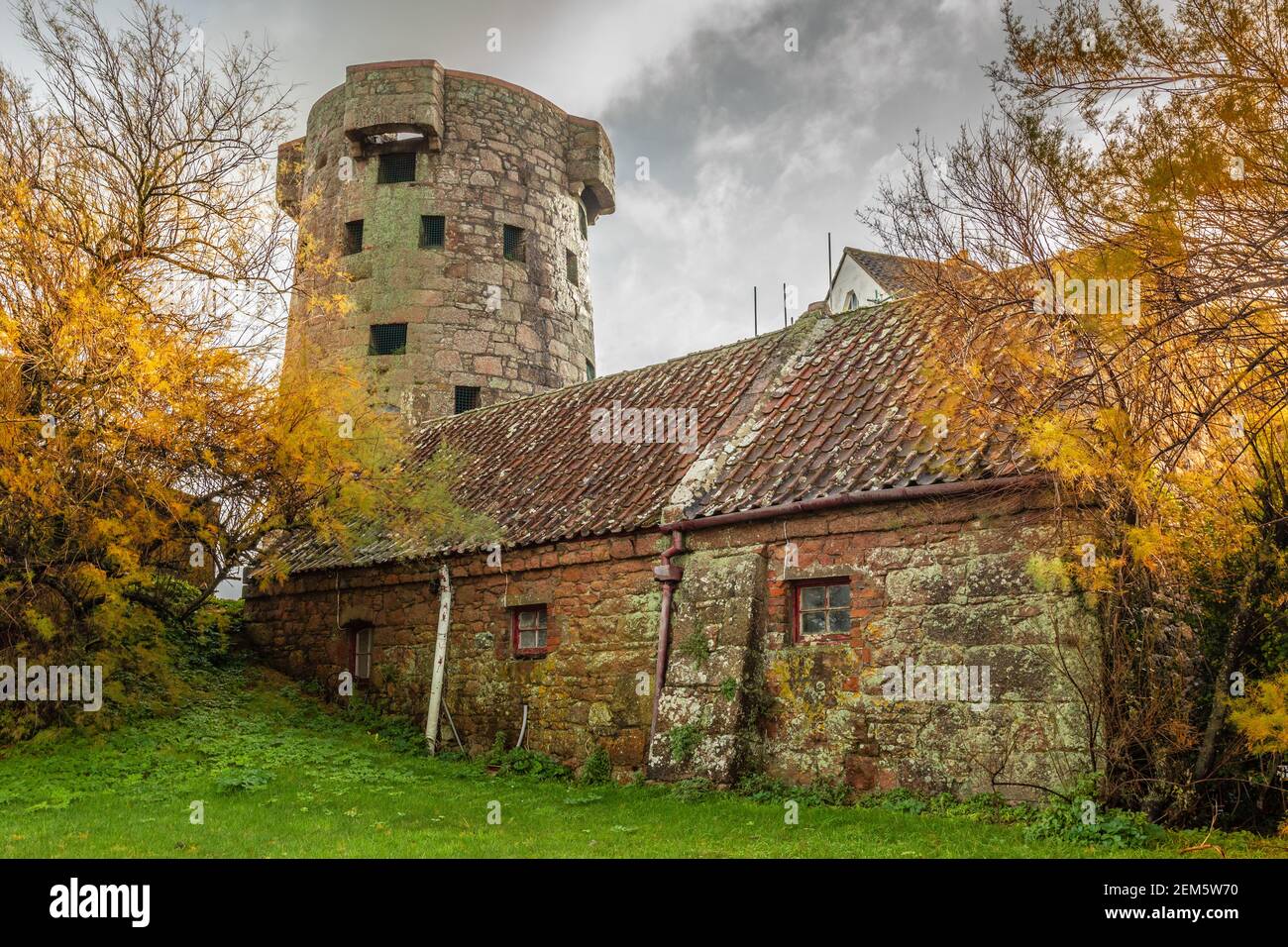 Grouville British round coastal defence tower, bailiwick of Jersey, Channel Islands Stock Photo