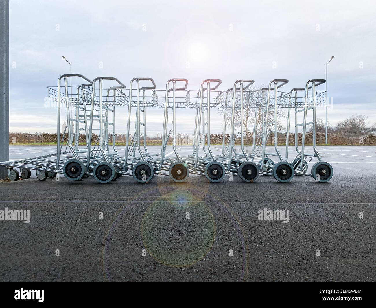 empty luggage trolleys standing on the bus station Stock Photo Alamy