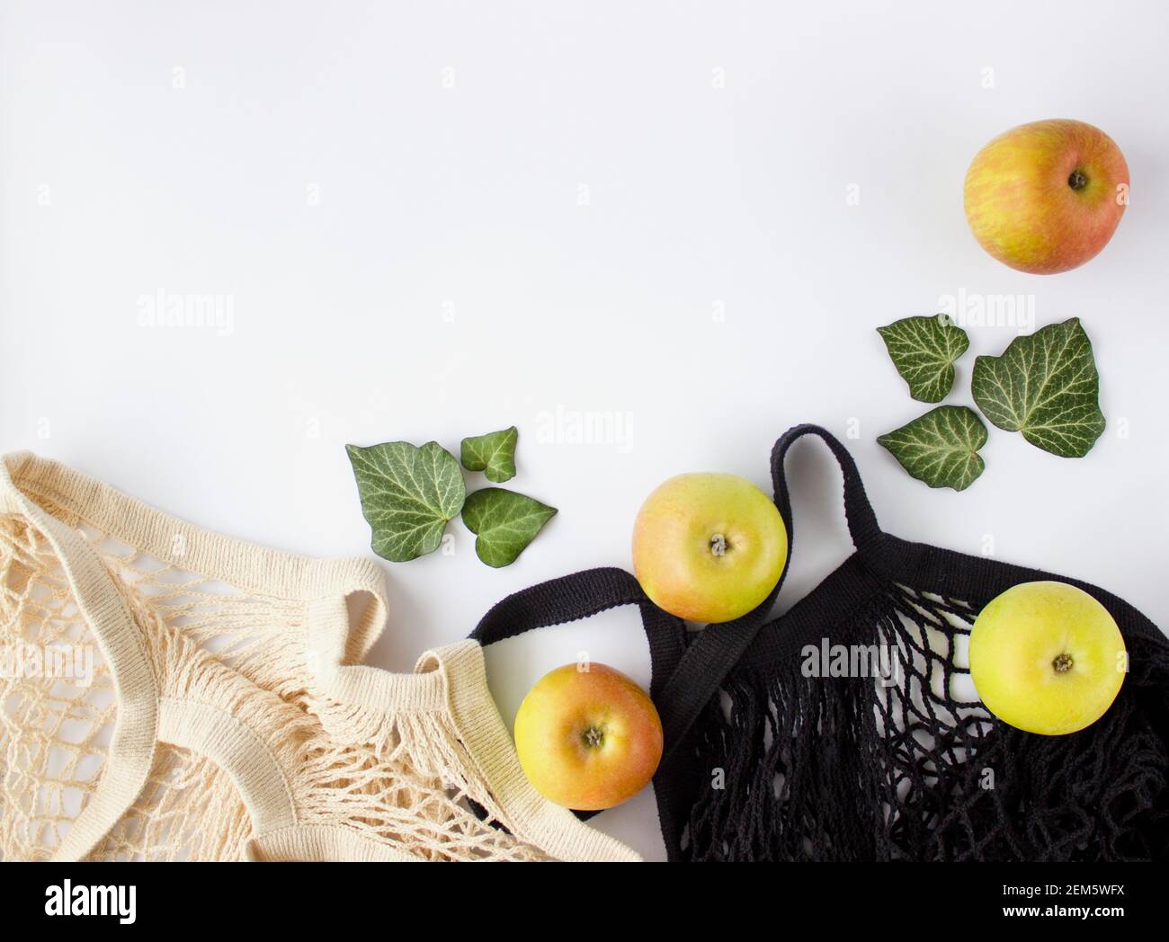 reusable bag of fruits With Green Apples on white background. Zero ...
