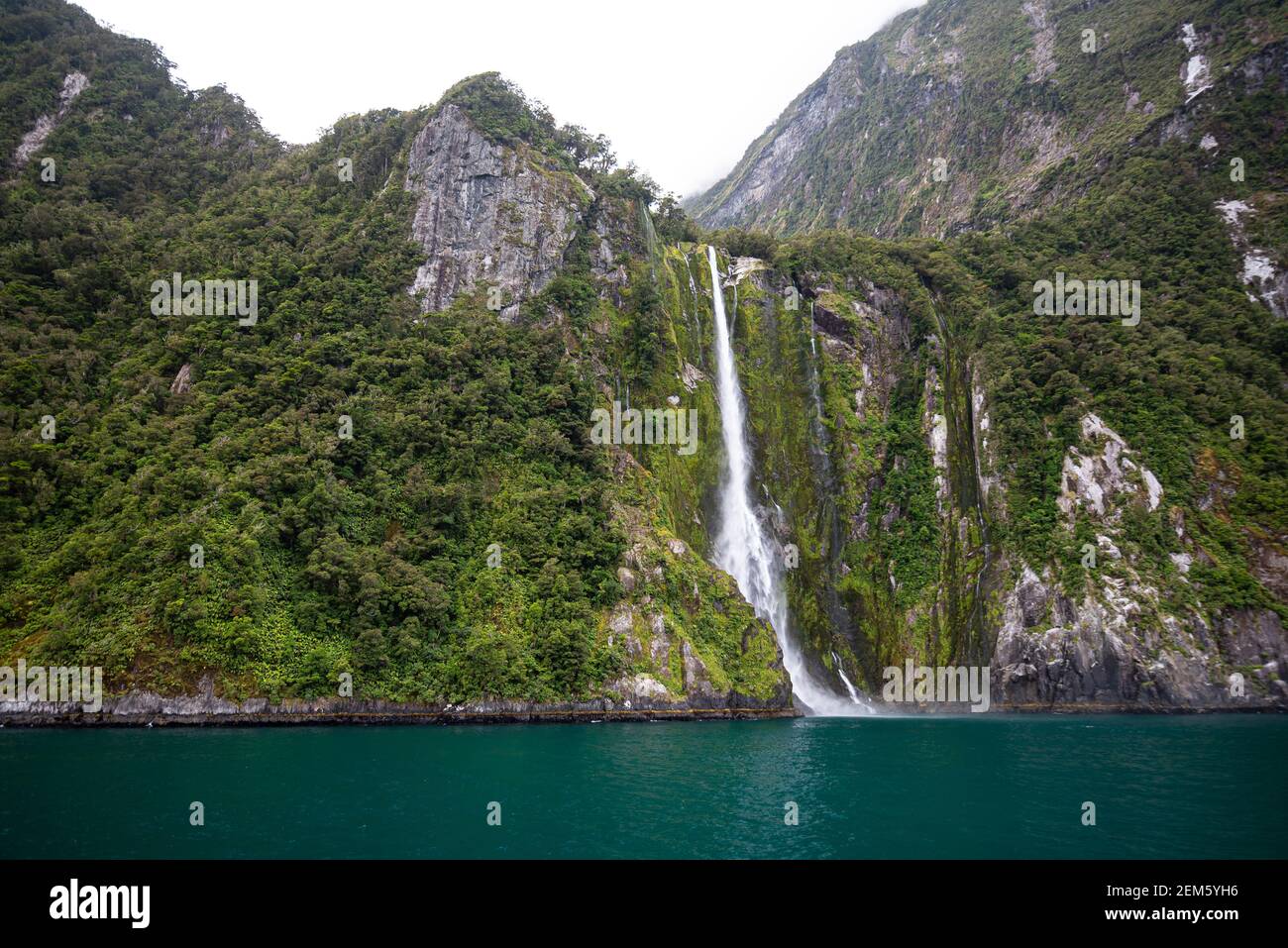 Milford Sound boat cruise - Stirling Falls, New Zealand Stock Photo