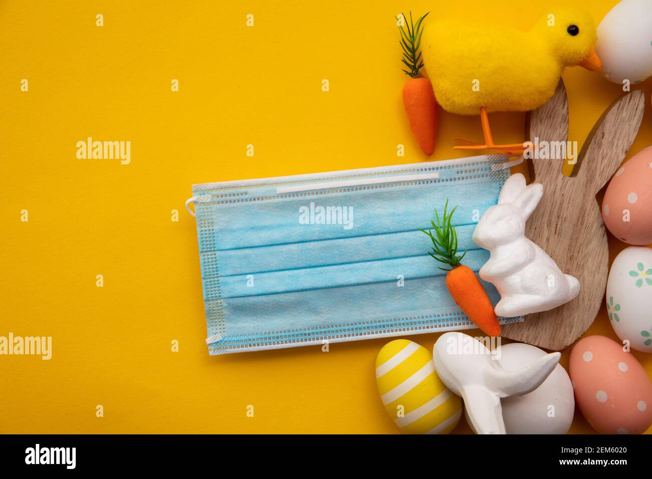 Happy easter background with easter bunny and eggs during covid Happy easter background with easter bunny and eggs during covid