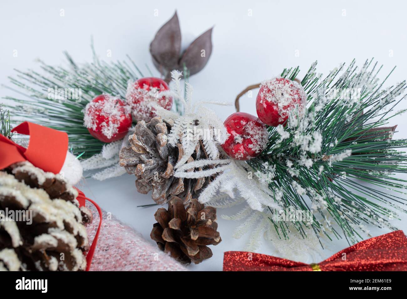 Christmas pinecone with pine leaves on white background Stock Photo - Alamy