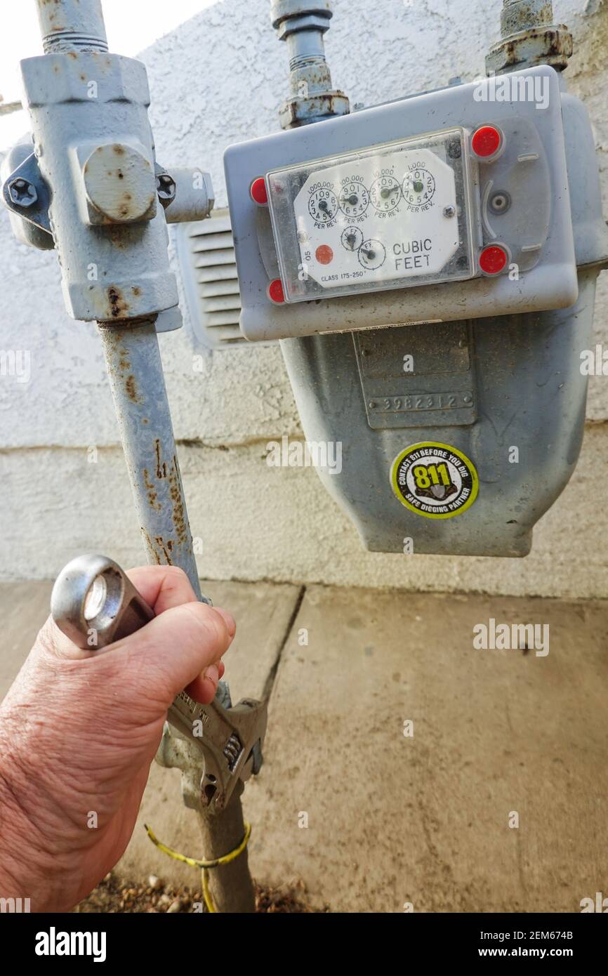 Residential home gas meter with wrench USA Stock Photo - Alamy