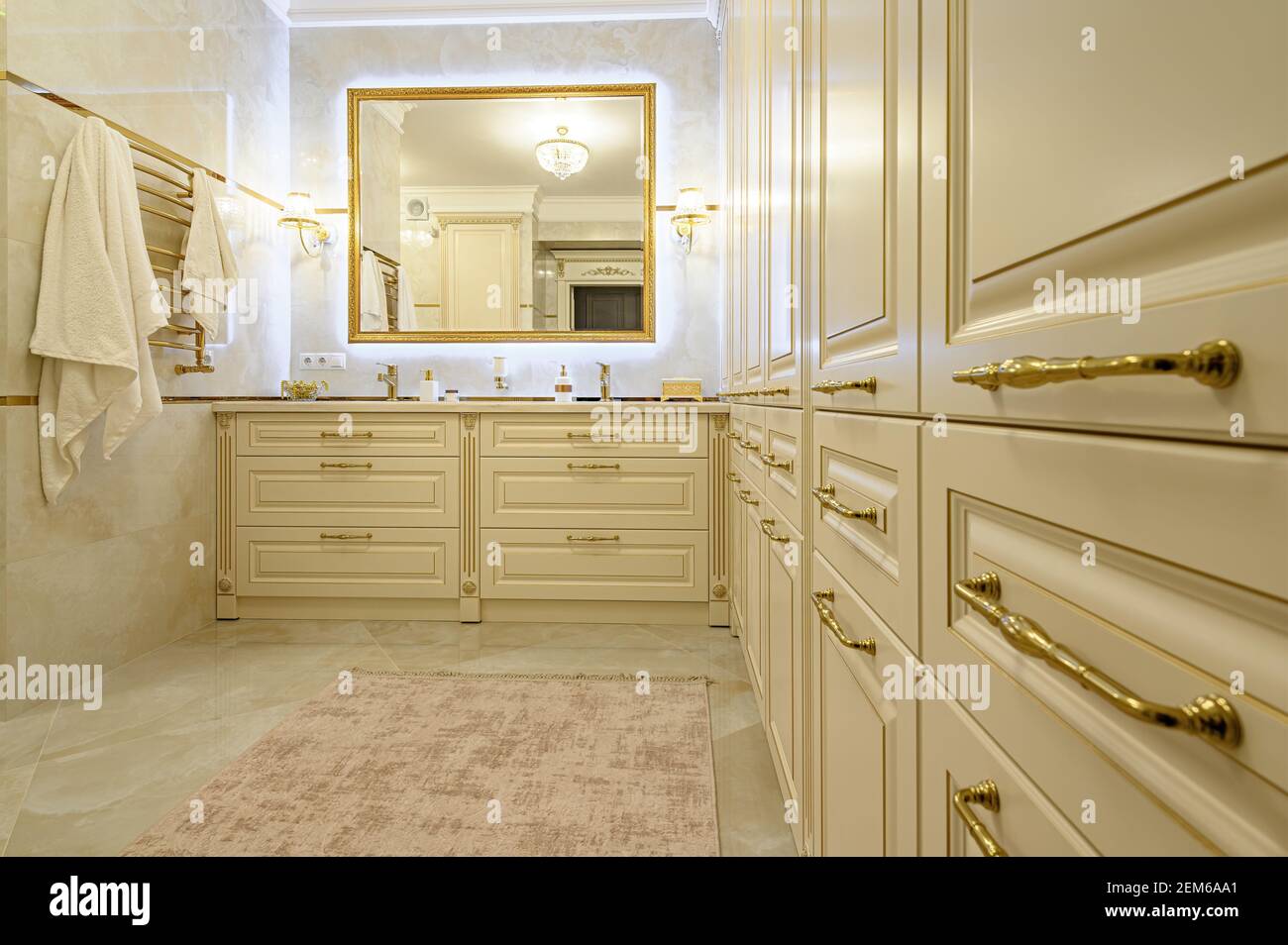 Modern luxury beige and golden bathroom Stock Photo - Alamy