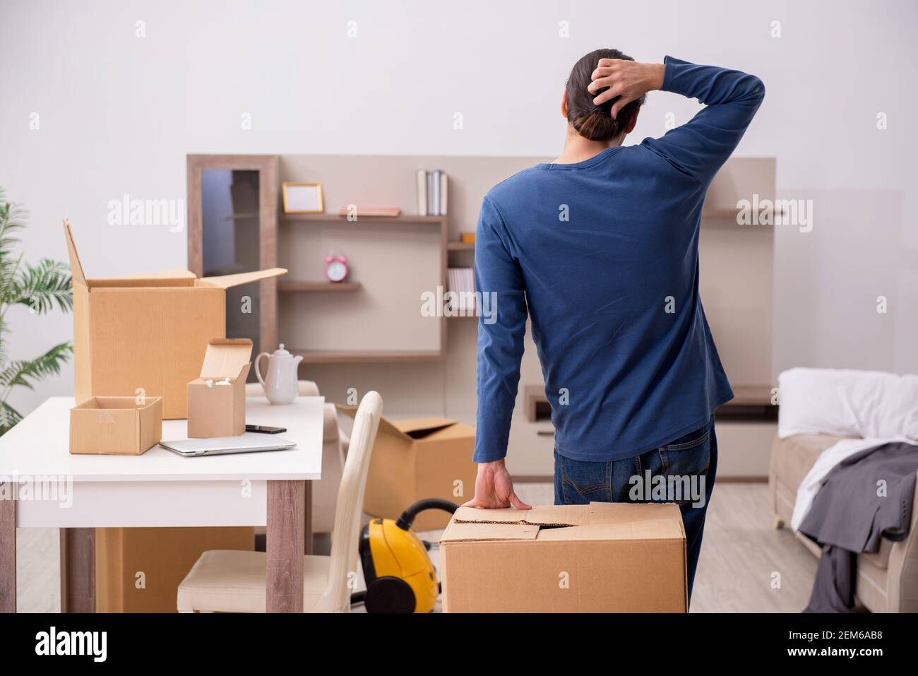 Back view confused young man hi-res stock photography and images - Alamy