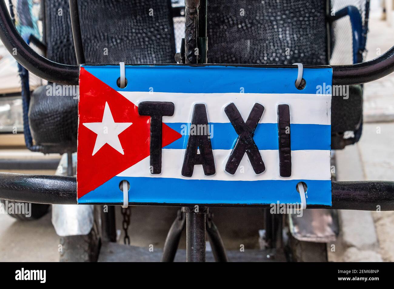 TAXI sign over a Cuban flag, Old Havana, Cuba Stock Photo