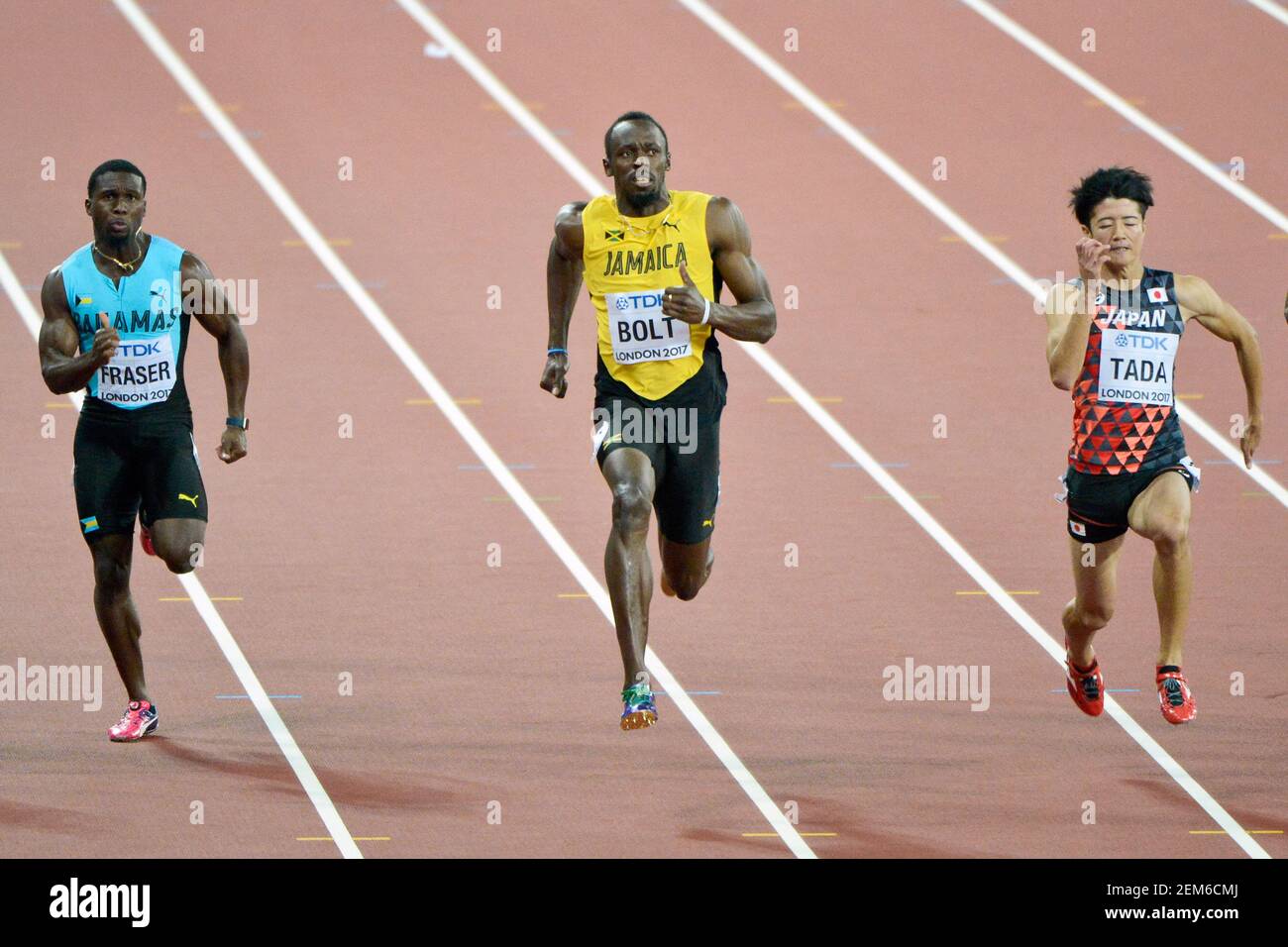 Usain Bolt (Jamaica), Warren Fraser (Bahamas), Shuhei Tada (Japan). 100 metres men, heats series. IAAF Athletics World Championships - London 2017 Stock Photo