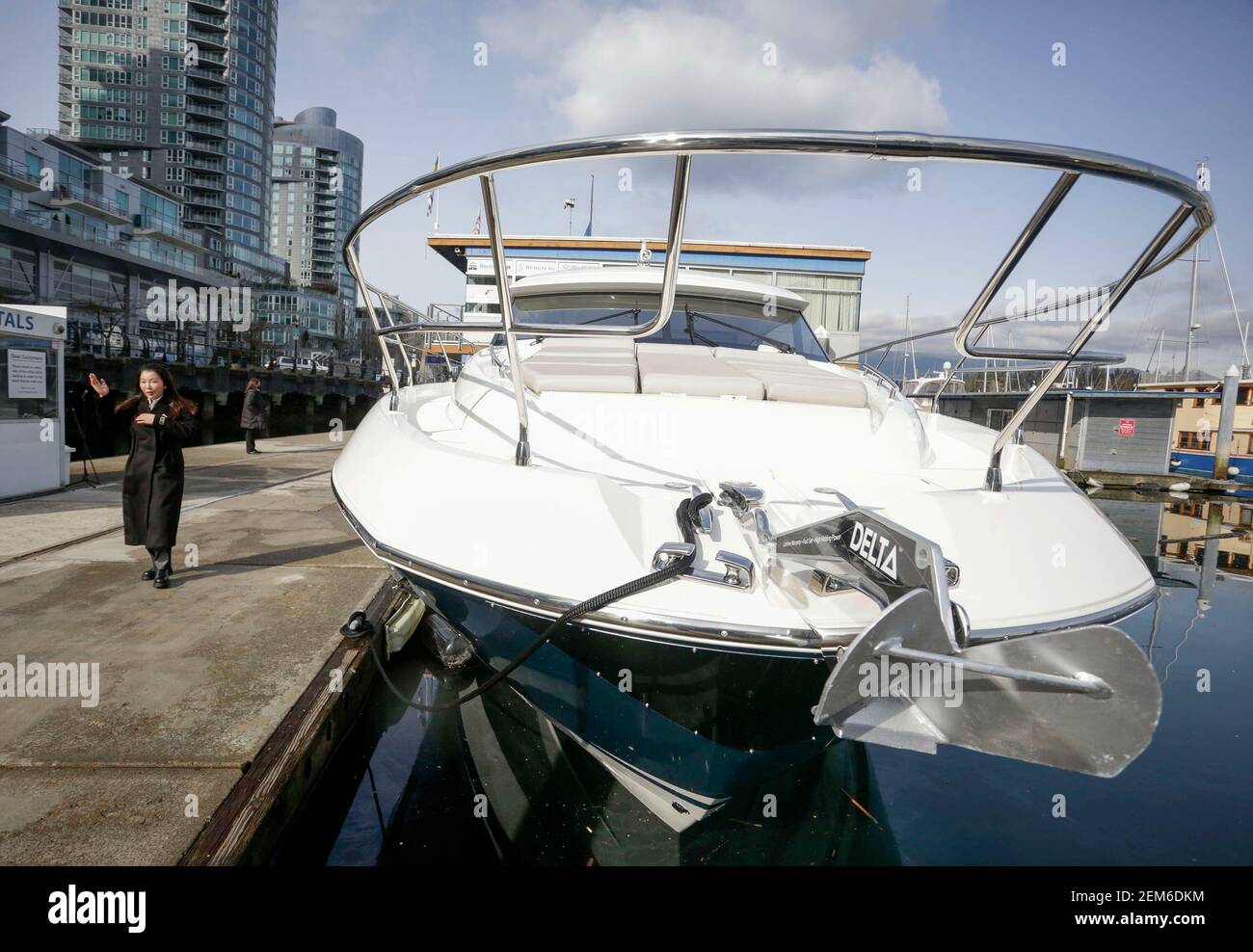 Vancouver, Canada. 24th Feb, 2021. A cruiser boat for display during the 2021 Vancouver International Boat Show is seen at a harbour in Vancouver, British Columbia, Canada, Feb. 24, 2021. The Vancouver International Boat Show which goes virtual this year due to the COVID-19 pandemic, kicked off on Wednesday, showcasing hundreds of new boats, products and accessories online. Credit: Liang Sen/Xinhua/Alamy Live News Stock Photo