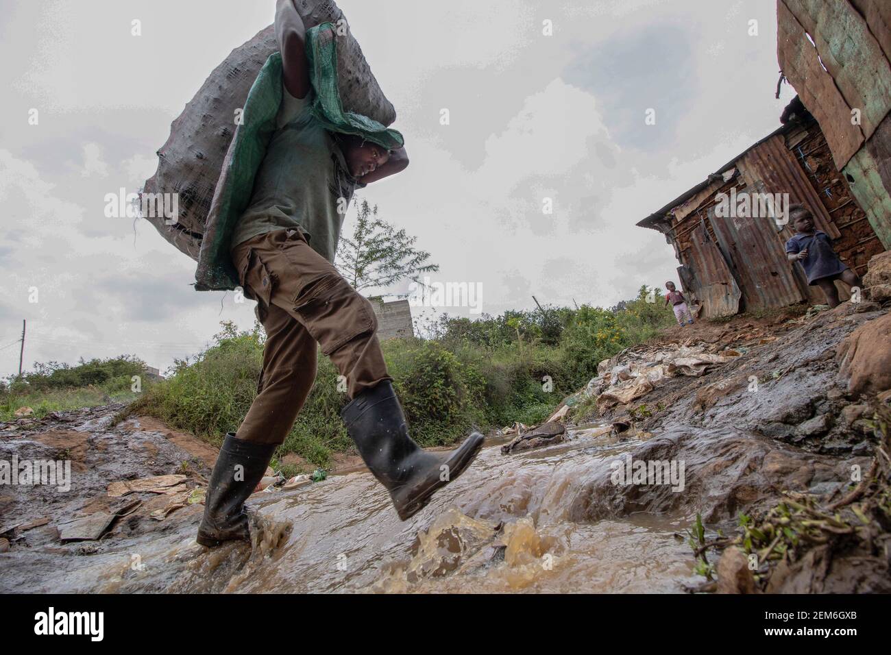 Man carrying sack charcoal on hi-res stock photography and images - Alamy
