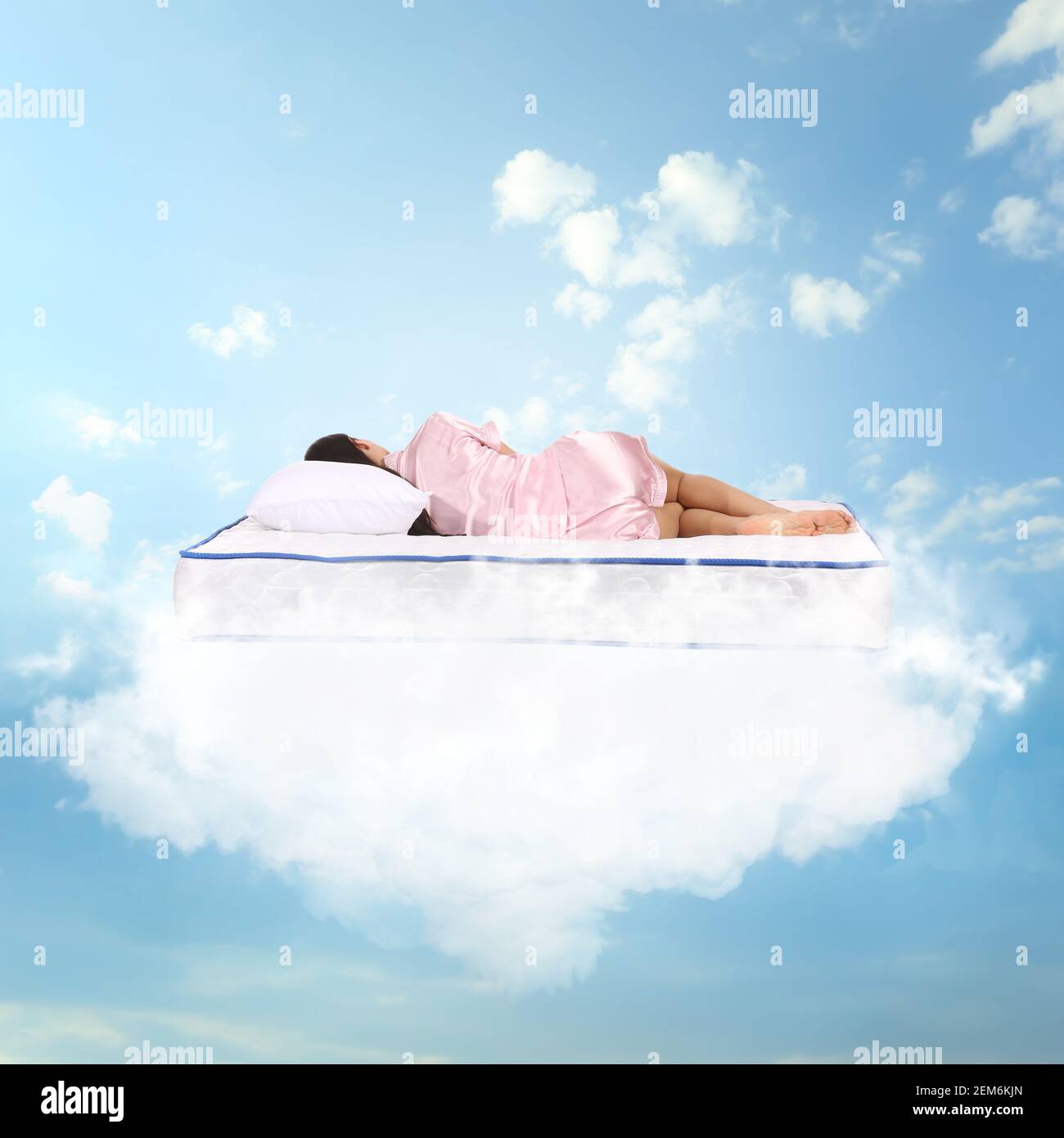 Sleeping woman on clouds hi-res stock photography and images - Alamy