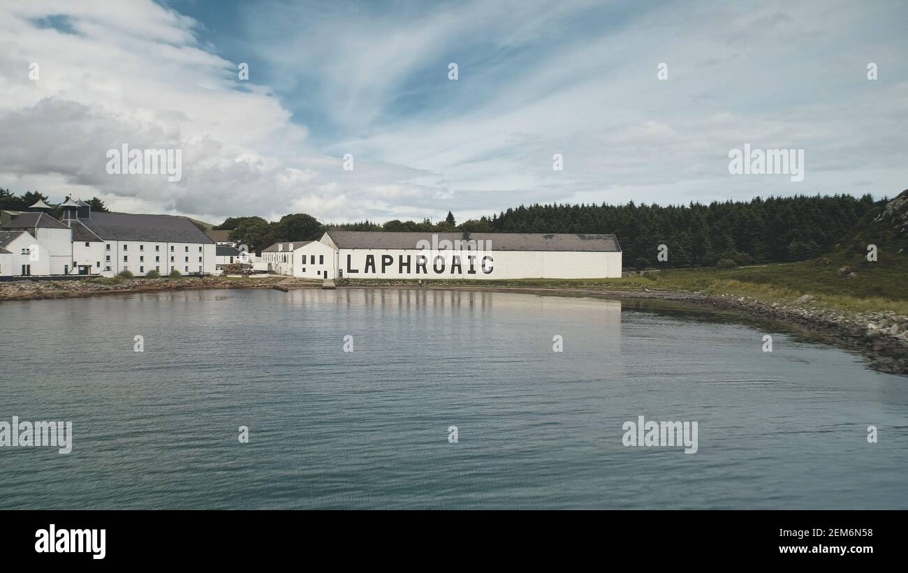 2018.08.07 - Laphroaig distillery, Port Ellen, Islay Island, United Kingdom. Europe whiskey industry. Closeup aerial alcohol industry, Great Britain. Old building at ocean bay. Nobody nature seascape Stock Photo