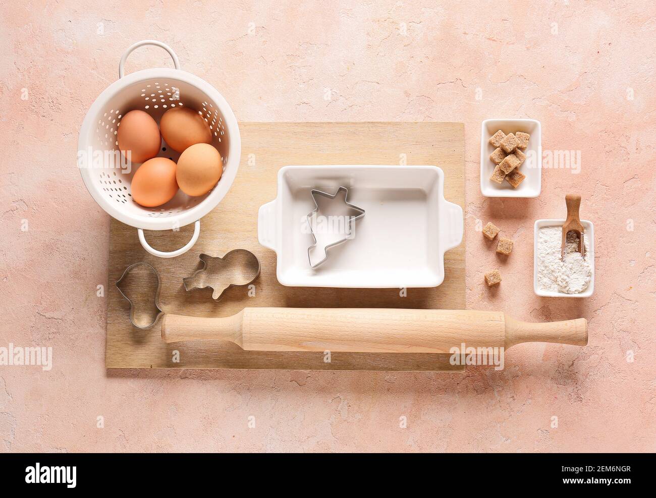 Set of kitchen utensils and ingredients for preparing bakery on color
