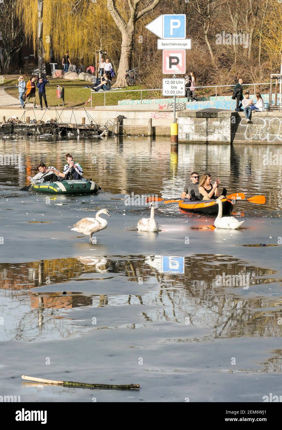 Berlin, Germany. 24th Feb, 2021. People row boats on the Landwehr Canal in  Berlin, capital of Germany, Feb. 24, 2021. More than 2.4 million COVID-19  infections have already been officially registered in