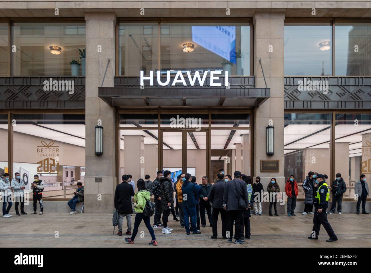 SHANGHAI, CHINA - FEBRUARY 25, 2021 - Customers line up in front of ...
