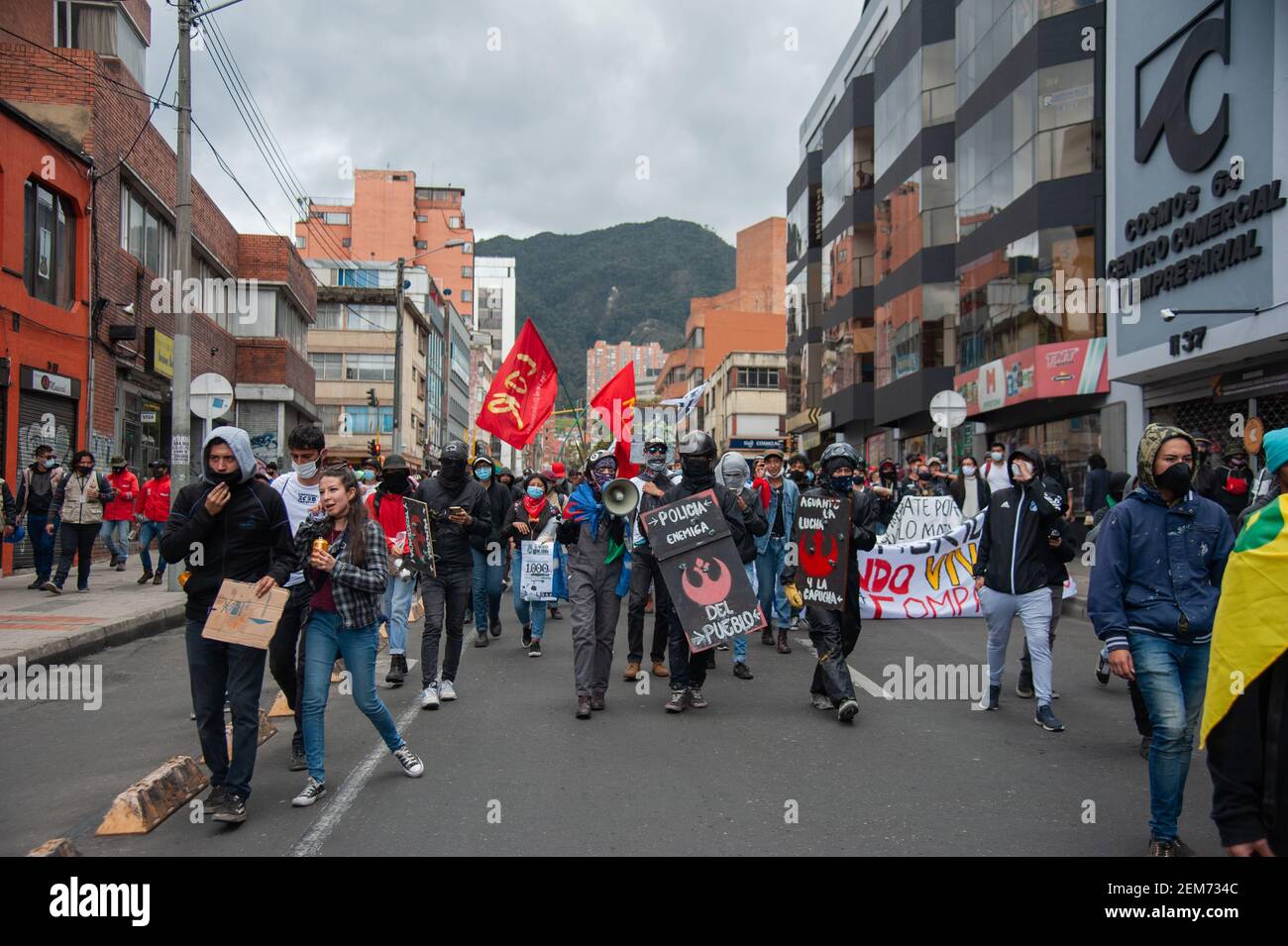 Demonstrators protest with posters and signs against the police and the ...