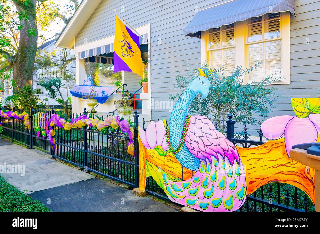 A house is decorated for Mardi Gras, Feb. 19, 2021, in Mobile, Alabama