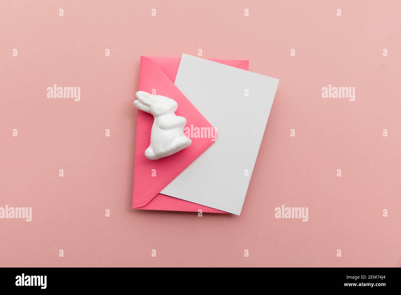 Easter blank card and envelope with white easter bunny Stock Photo