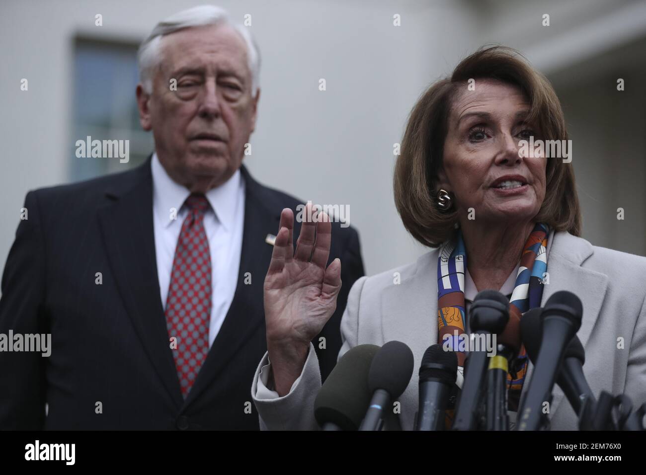 House Democratic leader Nancy Pelosi, D-CA, speaks to reporters on following a border security briefing with President Donald Trump and congressional leadership at the White House on January 2, 2018 in Washington, DC. Next to Pelosi, Rep. Steny Hoyer, D-Md. (Photo by Oliver Contreras/SIPA USA) Stock Photo