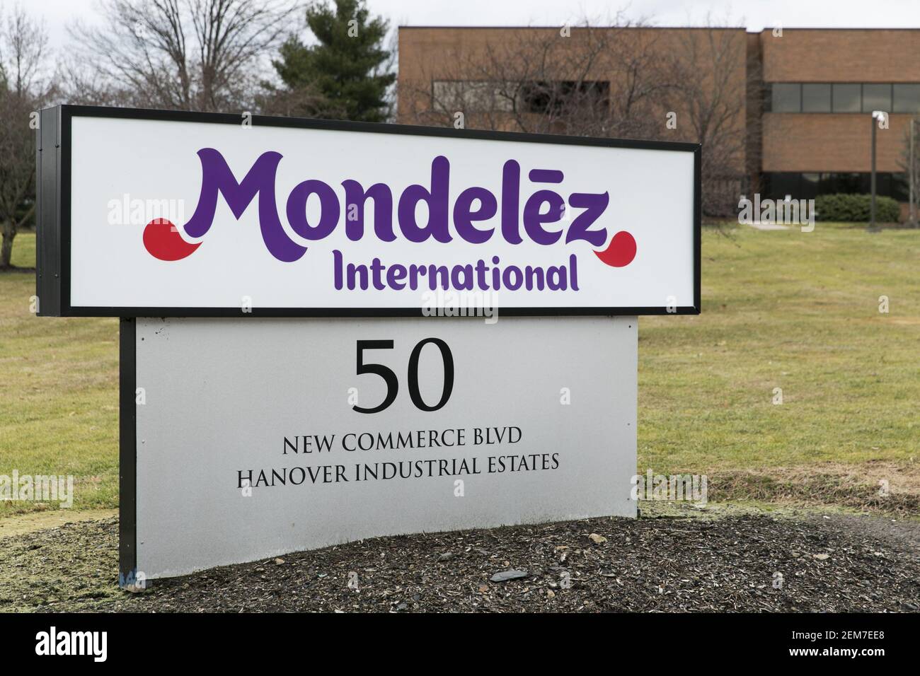 A logo sign outside of a facility occupied by Mondelez International