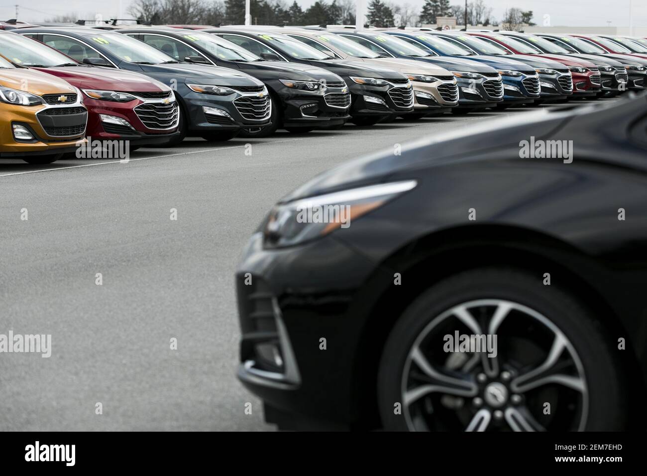 New Chevrolet (Chevy) sedan vehicles on a dealer lot in Muncy