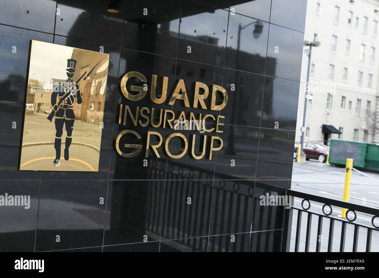 A logo sign outside of the headquarters of the GUARD Insurance Group in