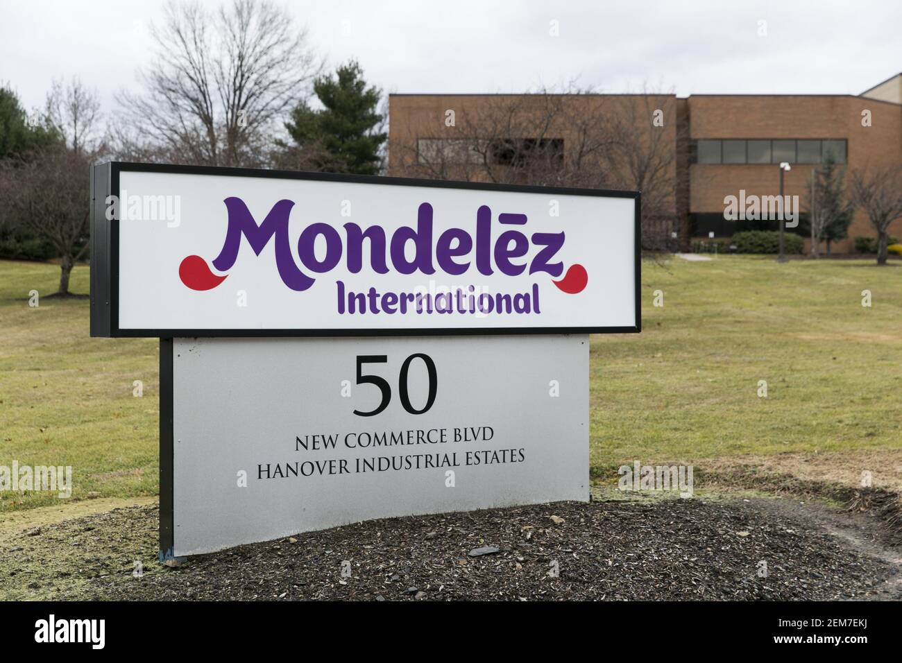 A logo sign outside of a facility occupied by Mondelez International