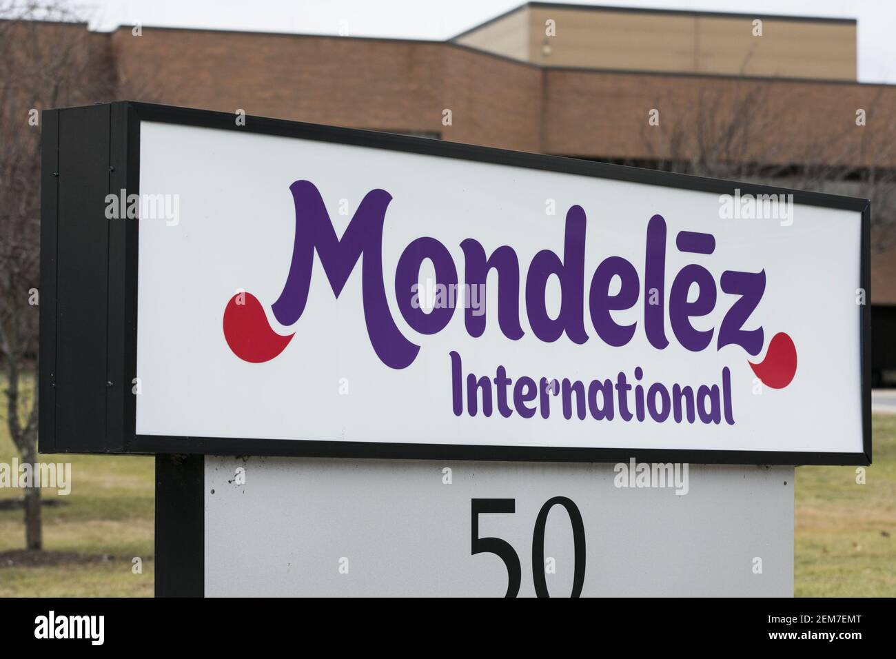 A logo sign outside of a facility occupied by Mondelez International