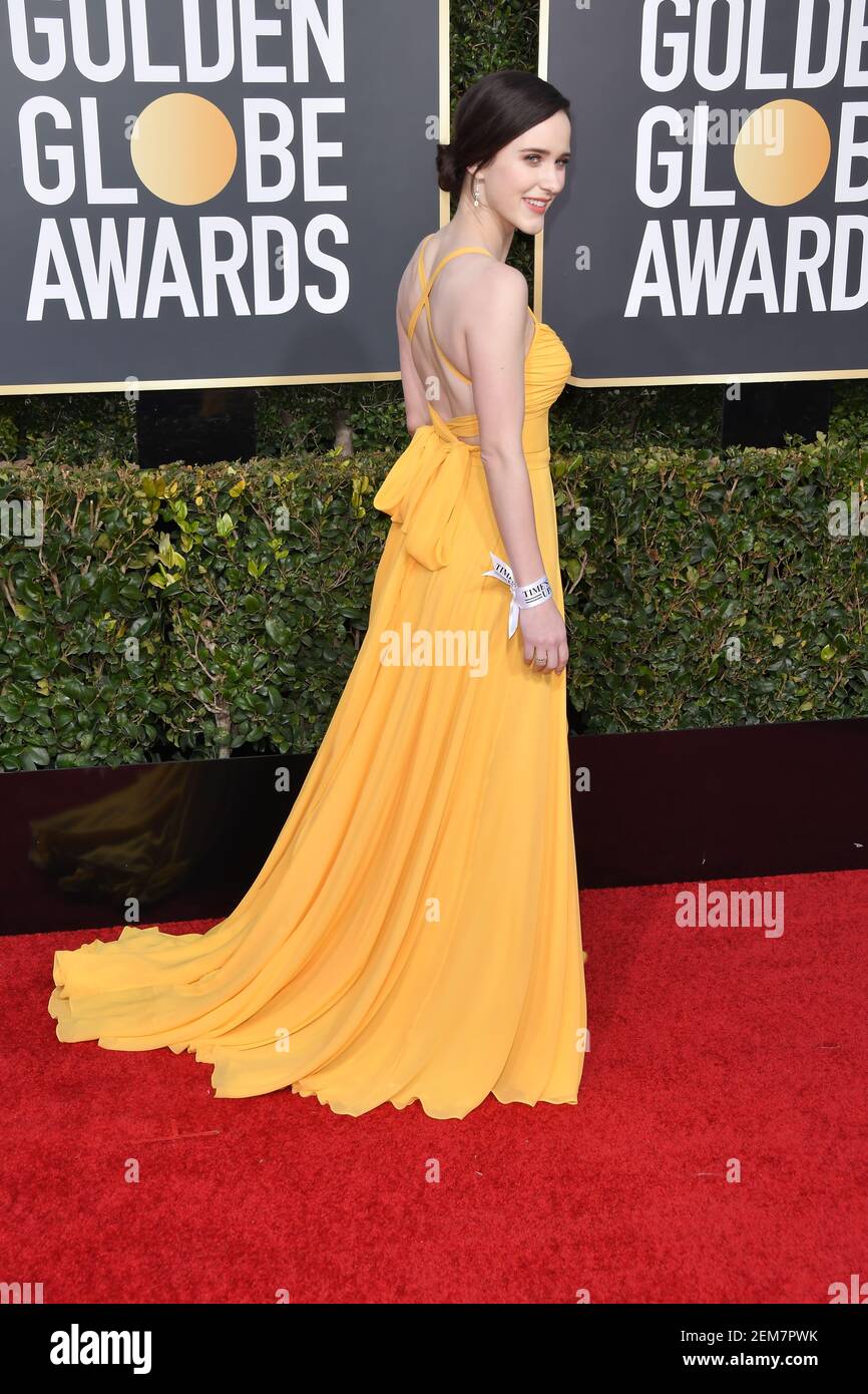 green emerald velvet dress Rachel Brosnahan, winner of the award for best performance by an actress in  a television series, musical or comedy for "The Marvelous Mrs. Maisel,"  arrives at the Amazon Golden Globes afterparty at