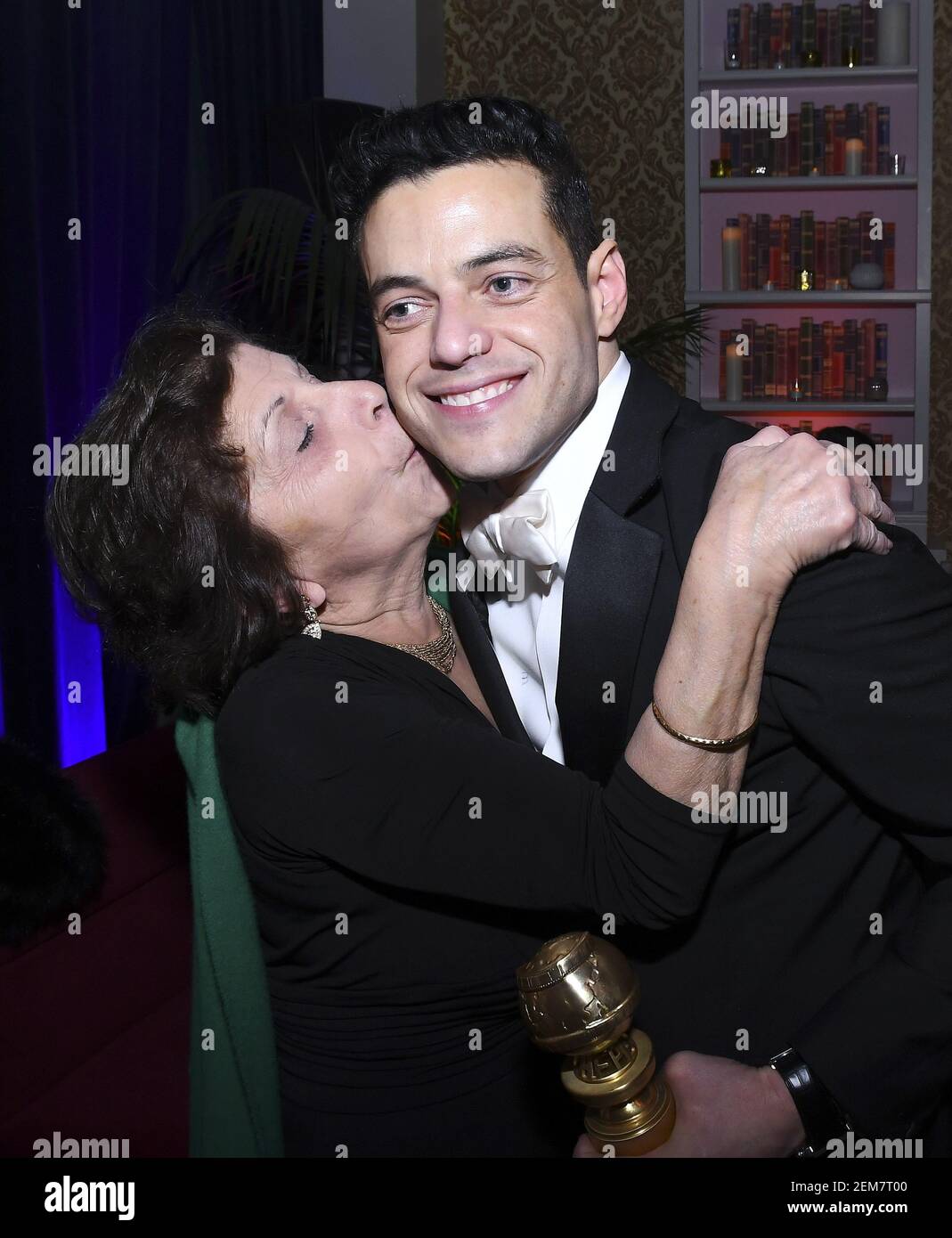 BEVERLY HILLS - JANUARY 6: Rami Malek (R) and his mother Nelly Malek attend  the 2019 Fox Nominee Party for the 76th Annual Golden Globe Awards at the  Fox Terrace on the