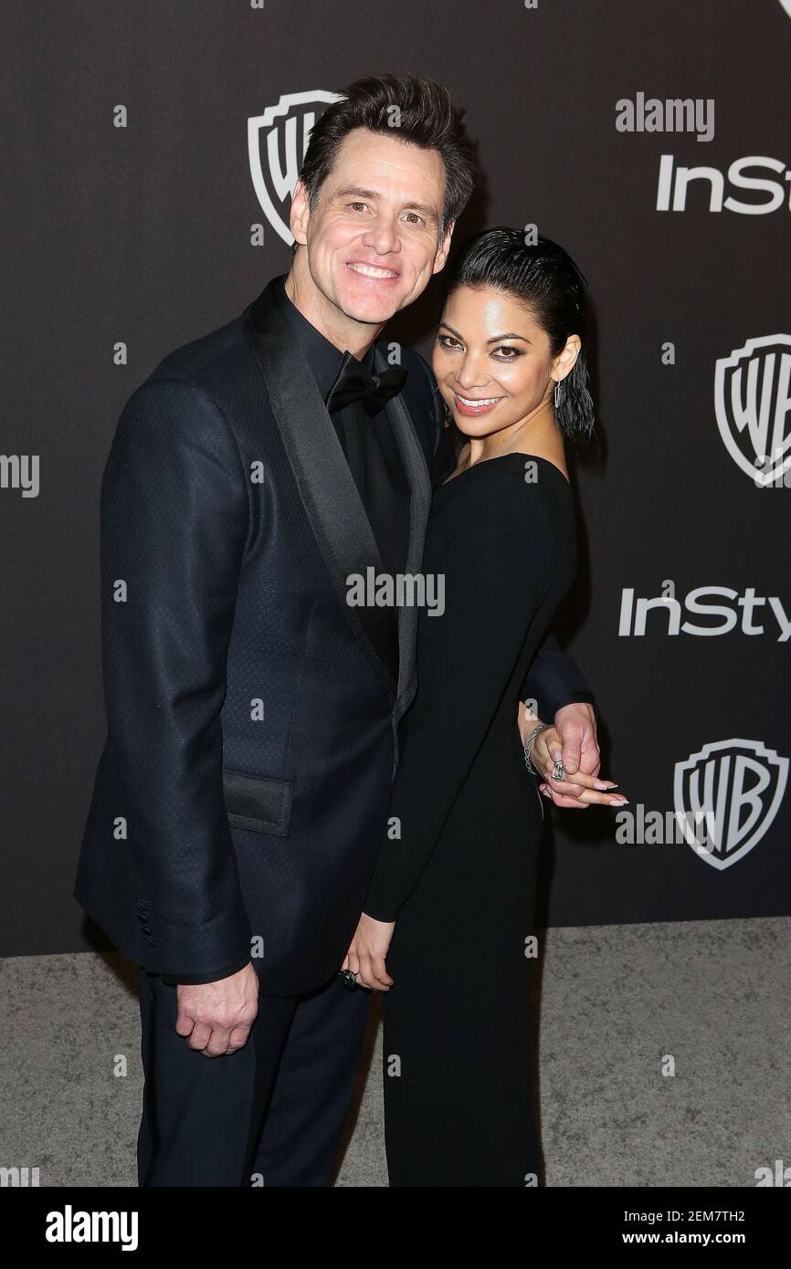 Jim Carrey, Ginger Gonzaga attend the InStyle And Warner Bros. Golden