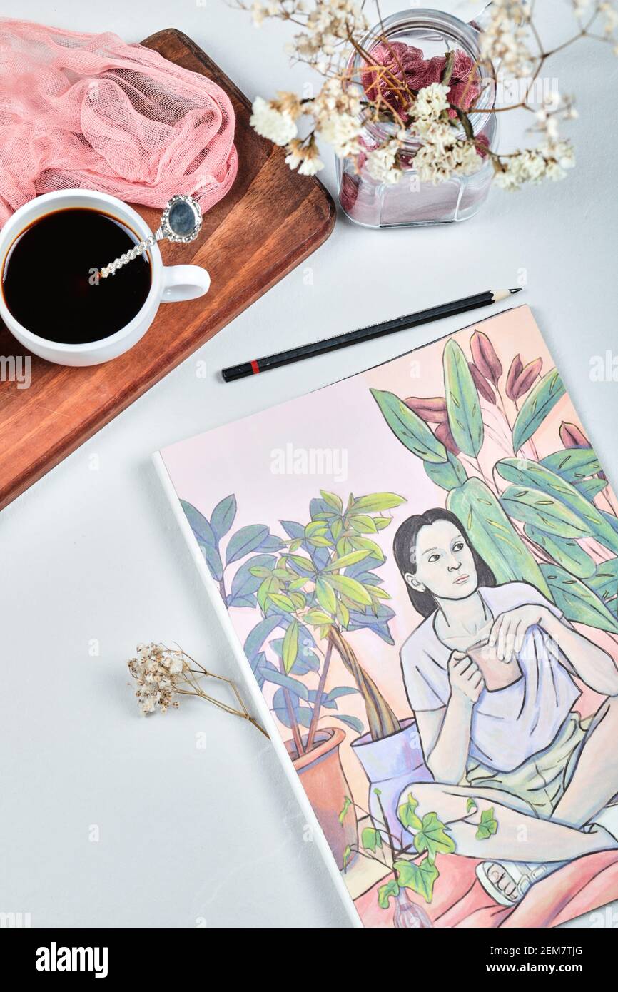 Painting with pencil, cup of coffee, flower on the white background Stock Photo