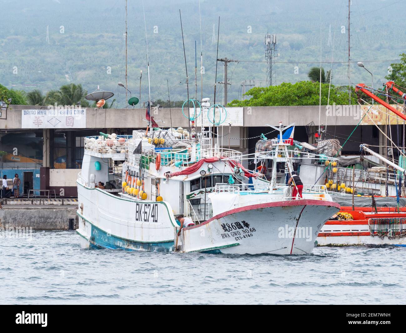 Chinese fishing boat leaving Davao Fish Port Complex in Davao, the Philippines. Stock Photo
