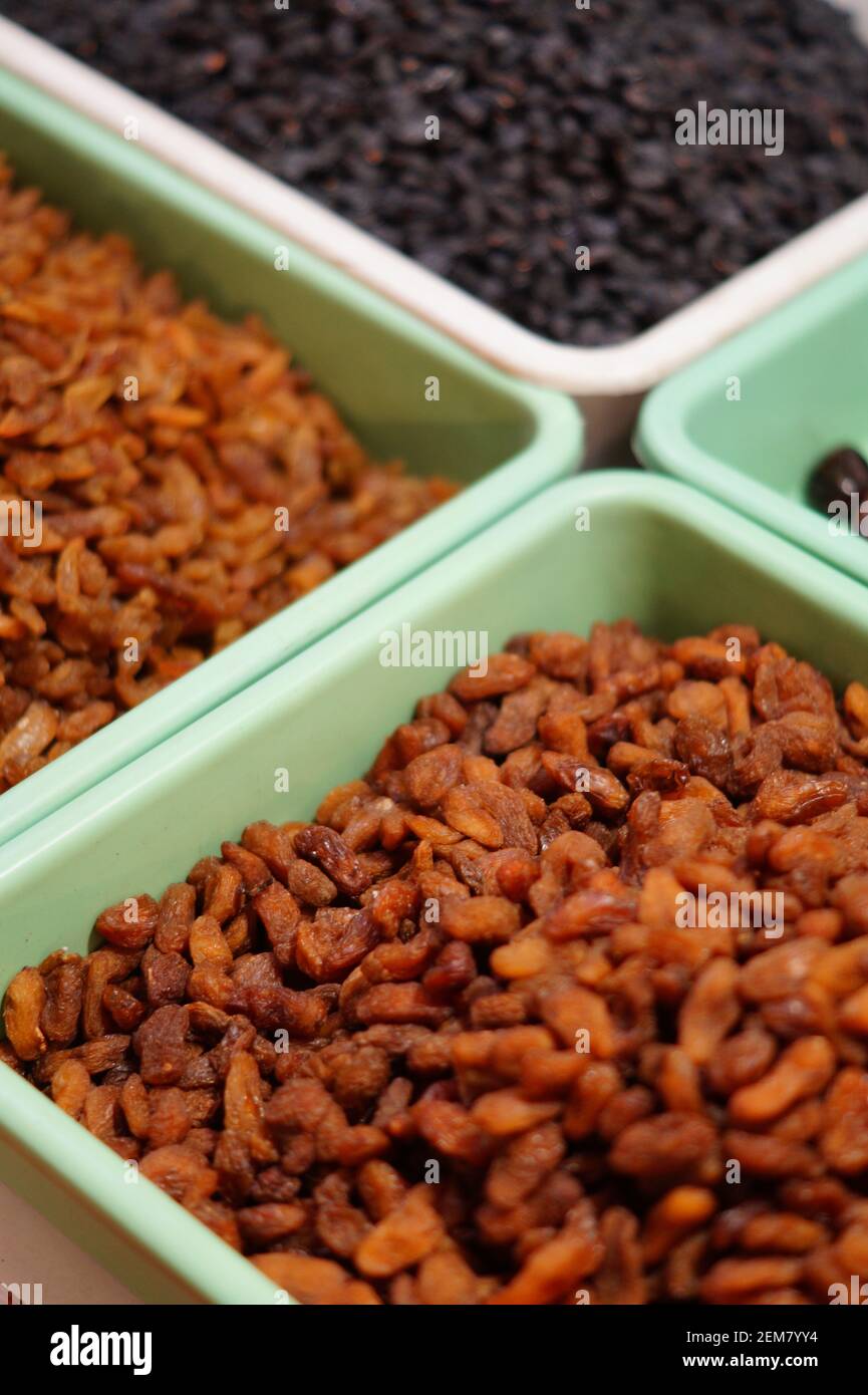 Close-up view of Indian dry fruits raisins in the market Stock Photo